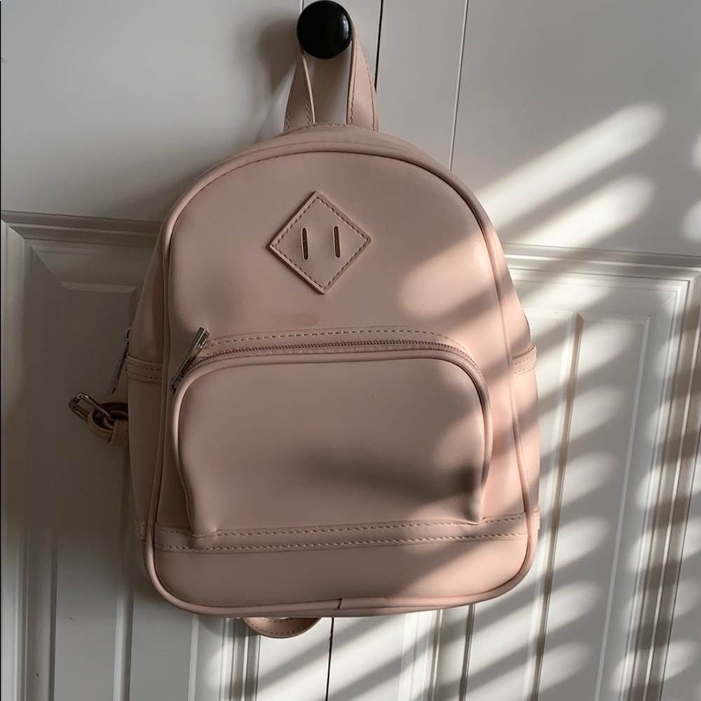 Pink (fake) leather, mini-backpack